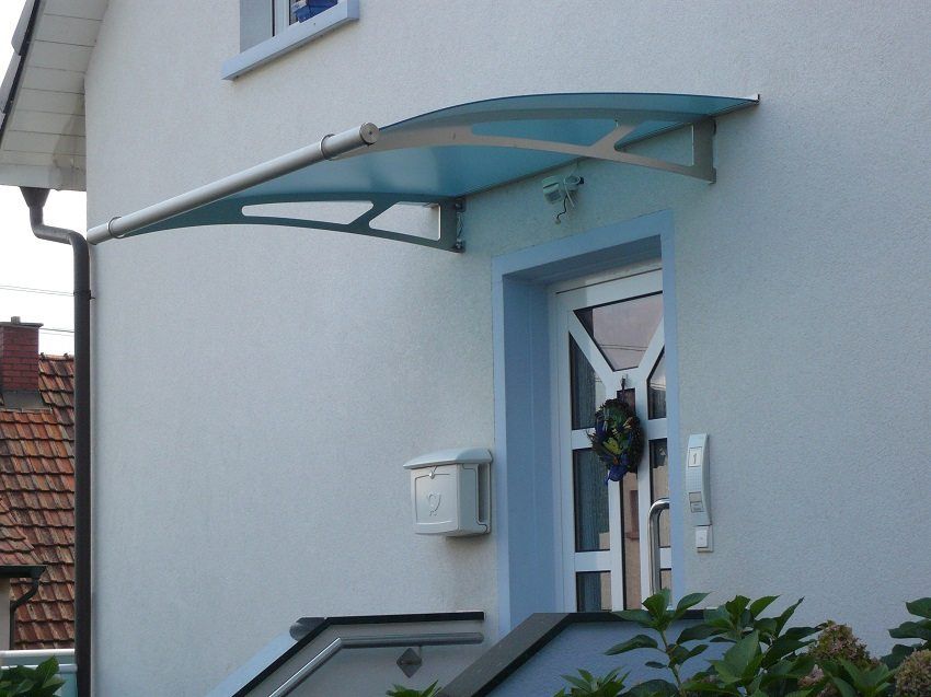 Visor nad verandou z polykarbonátu. Fotografie a funkcie návrhu